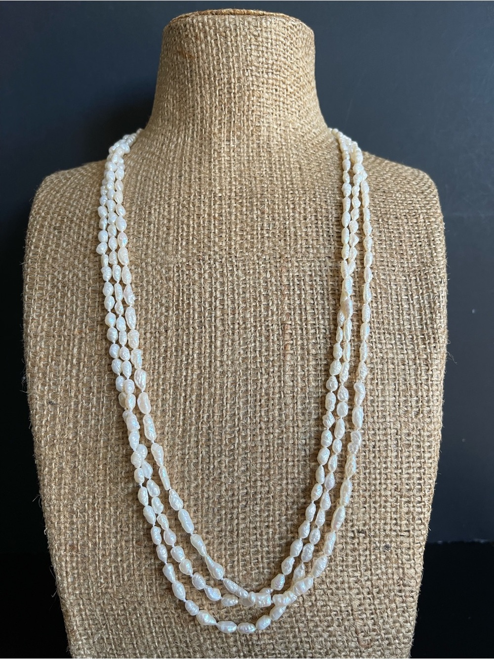 Elegant White Freshwater Pearl Triple-Strand Necklace with 14KT GF clasp.